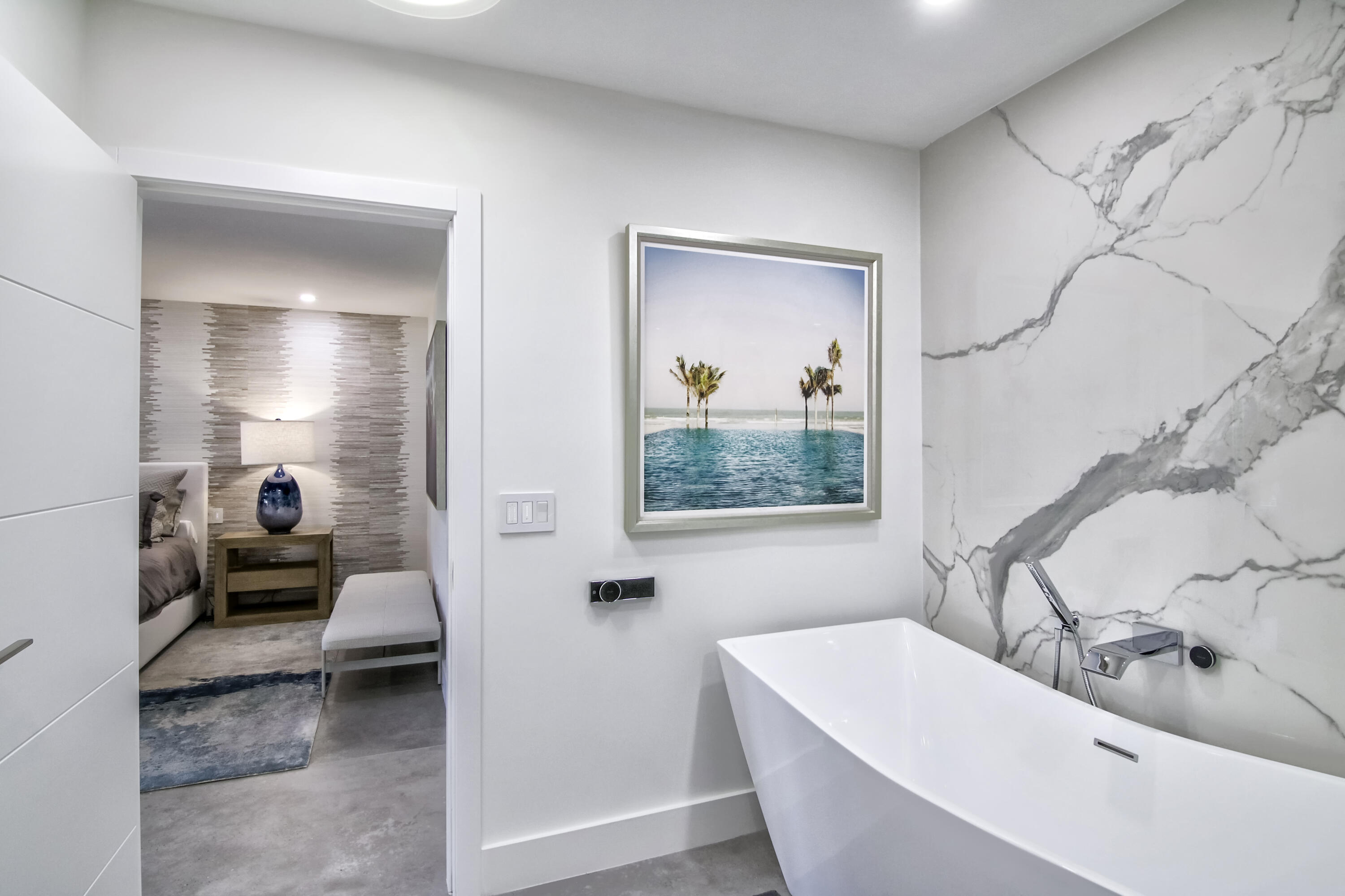 13244 Polo Club Road, Unit C105 Wellington, FL 33414 - Photo 25 of 42 a bathroom with a bathtub and a sink