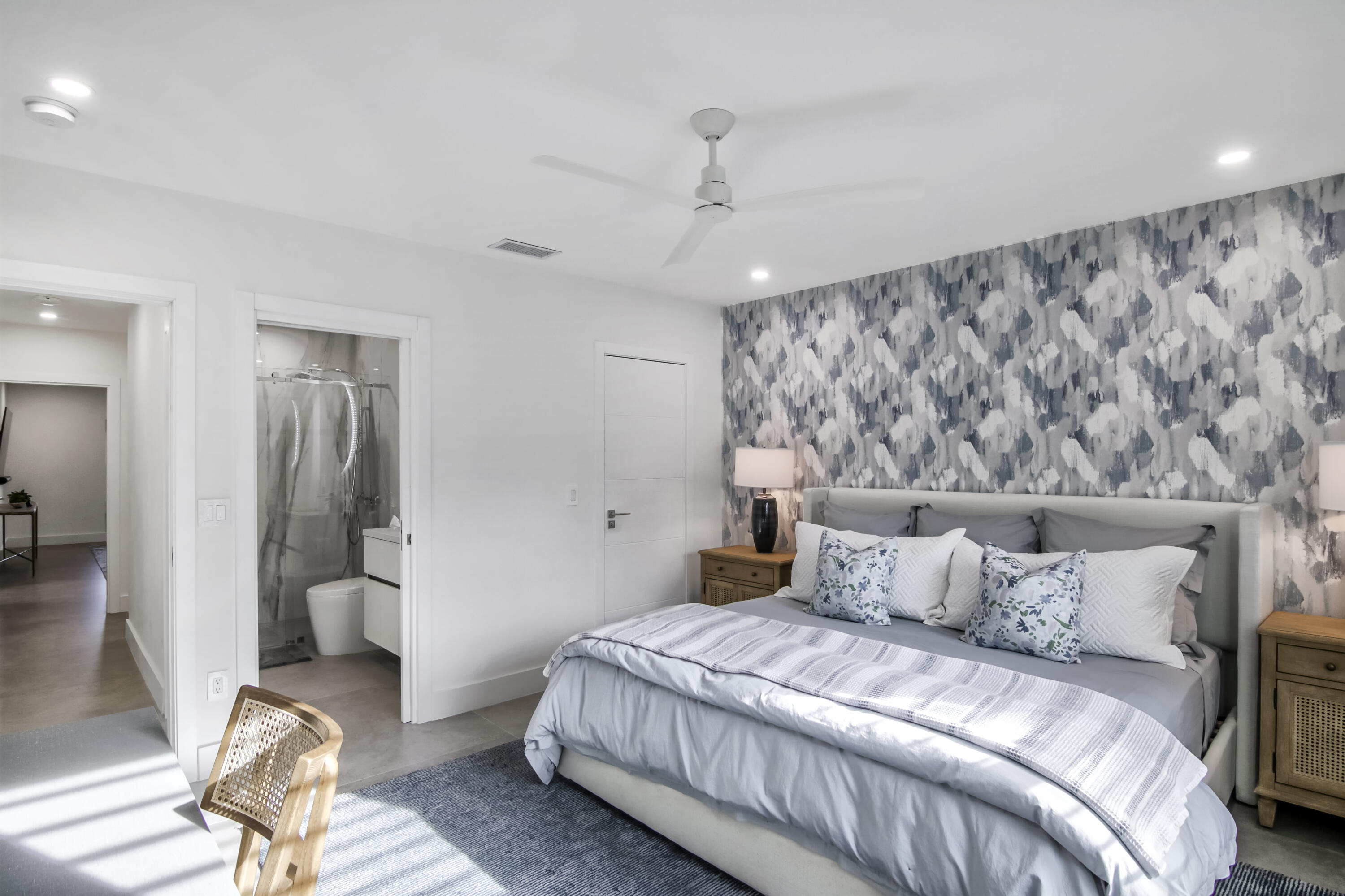 13244 Polo Club Road, Unit C105 Wellington, FL 33414 - Photo 30 of 42 a bedroom with a large bed and a couch