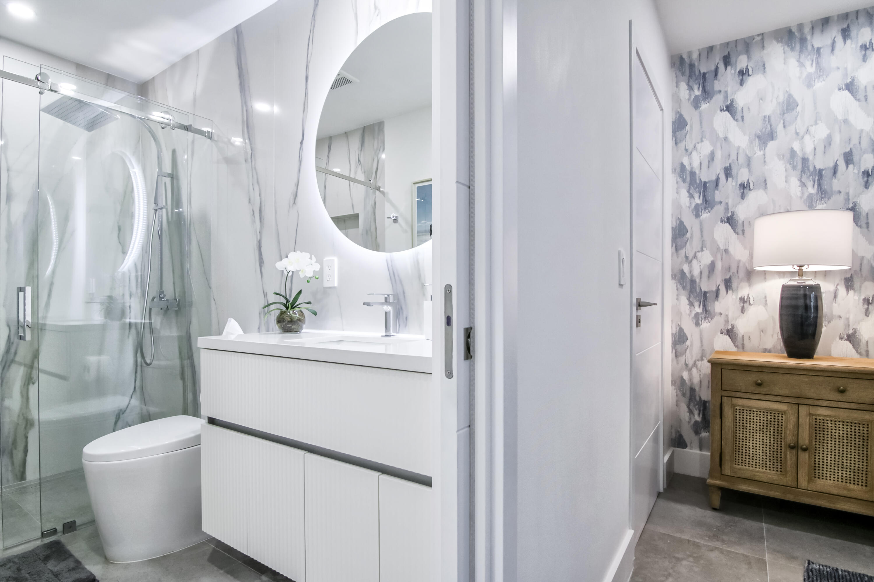 13244 Polo Club Road, Unit C105 Wellington, FL 33414 - Photo 31 of 42 a bathroom with a sink a toilet and shower