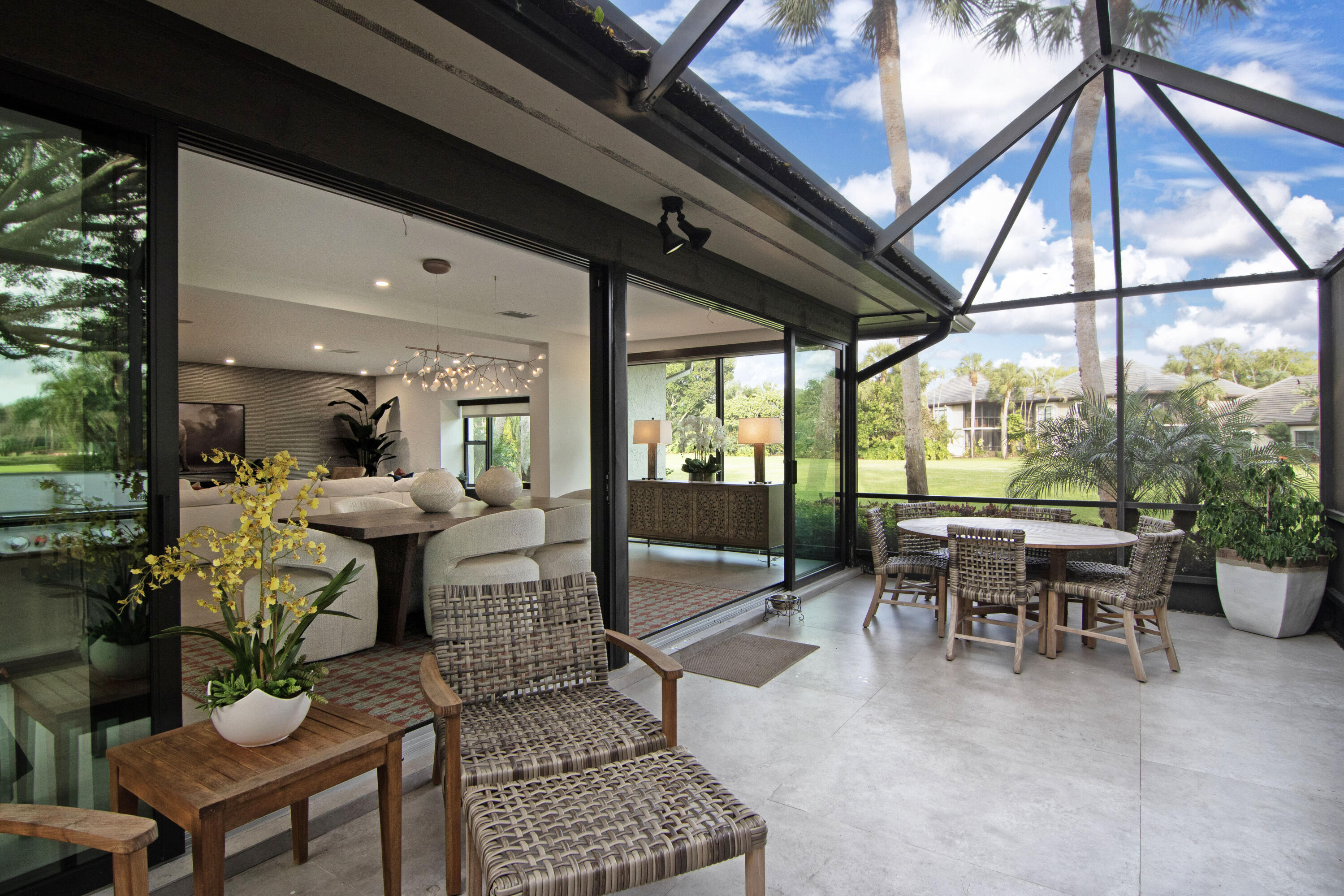 13244 Polo Club Road, Unit C105 Wellington, FL 33414 - Photo 38 of 42 a outdoor space with lots of furniture and garden view