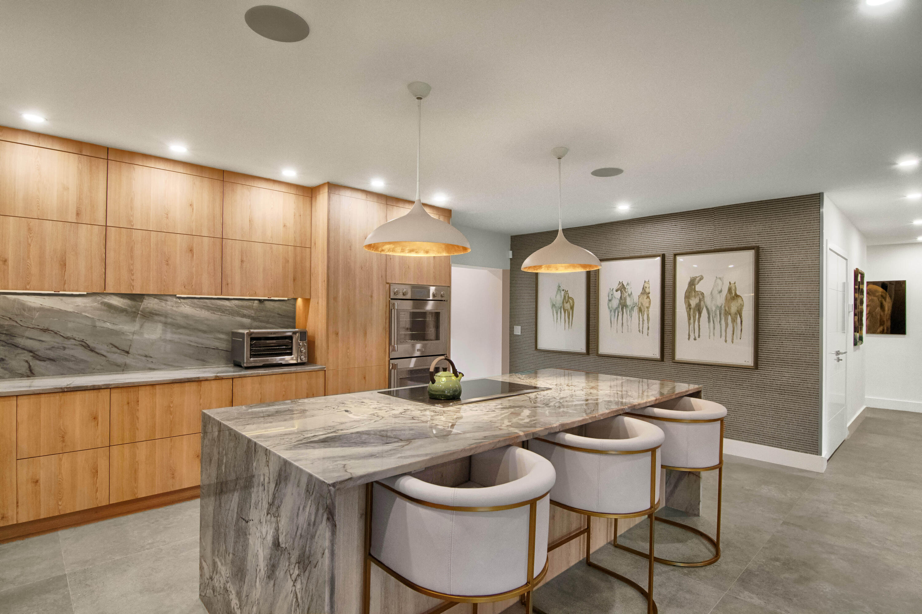 13244 Polo Club Road, Unit C105 Wellington, FL 33414 - Photo 8 of 42 a open kitchen with a stove a sink and a refrigerator