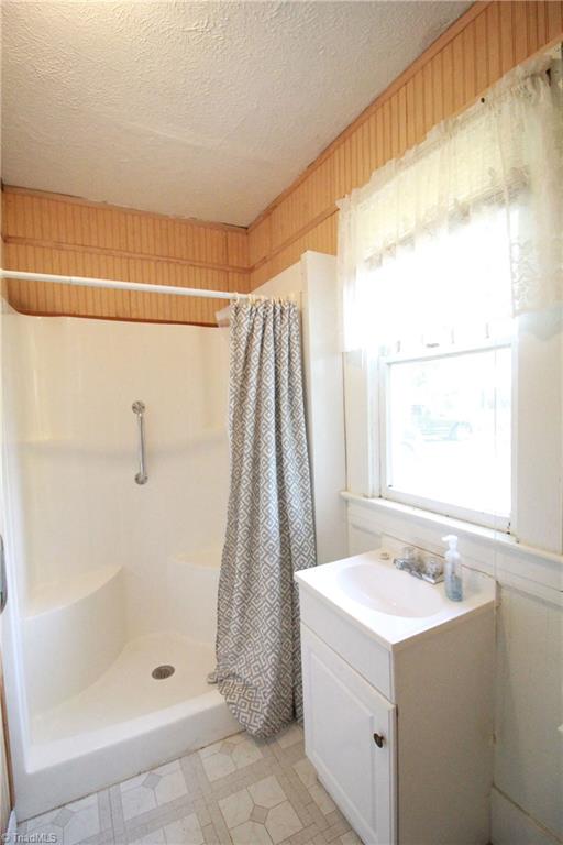 2067 Riverside Circle Eden, NC 27288 - Photo 48 of 50 Second full bathroom, vinyl flooring, large shower