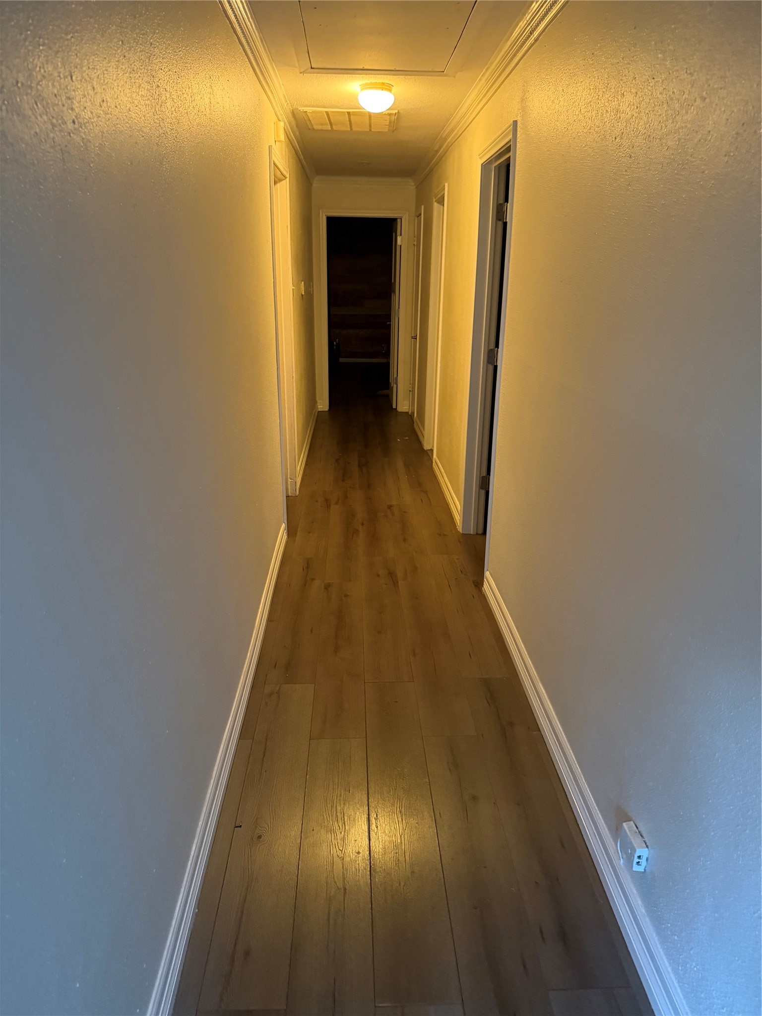 6811 St Augustine Street Houston, TX 77021 - Photo 12 of 20 a view of a hallway with wooden floor