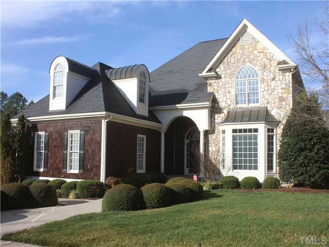 12501 Ribbongrass Court Raleigh, NC 27614 - Photo 1 of 25 Gorgeous custom home in desiresable Dunleith section of Wakefield plantation. Stone and cedar accents enhance the curb appeal of this corner lot with professional landscape. Exterior Front