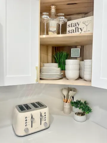 a kitchen with a sink and a stove