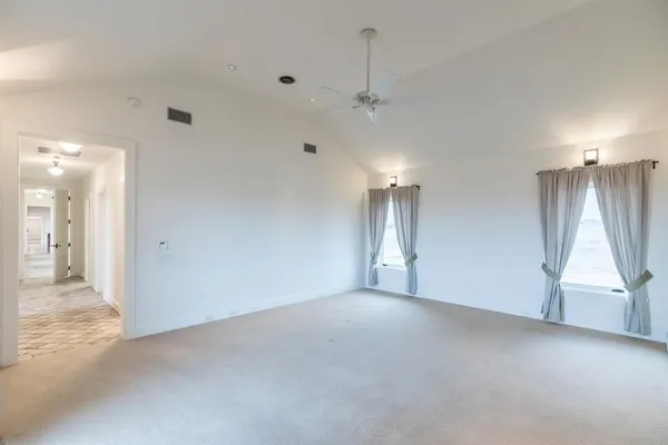an empty room with windows