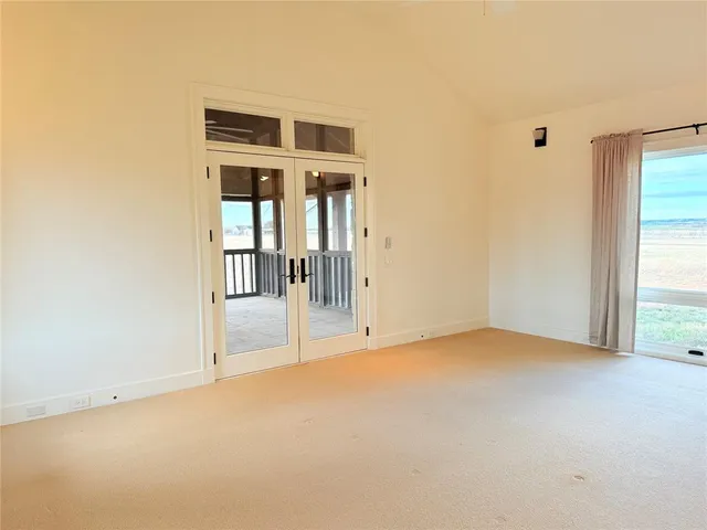 a large bathroom with a double vanity sink a mirror and a bathtub