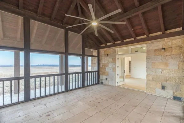 a large bathroom with a double vanity sink a mirror and a bathtub