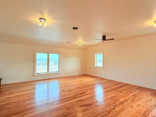 a bathroom with a toilet a sink and bathtub