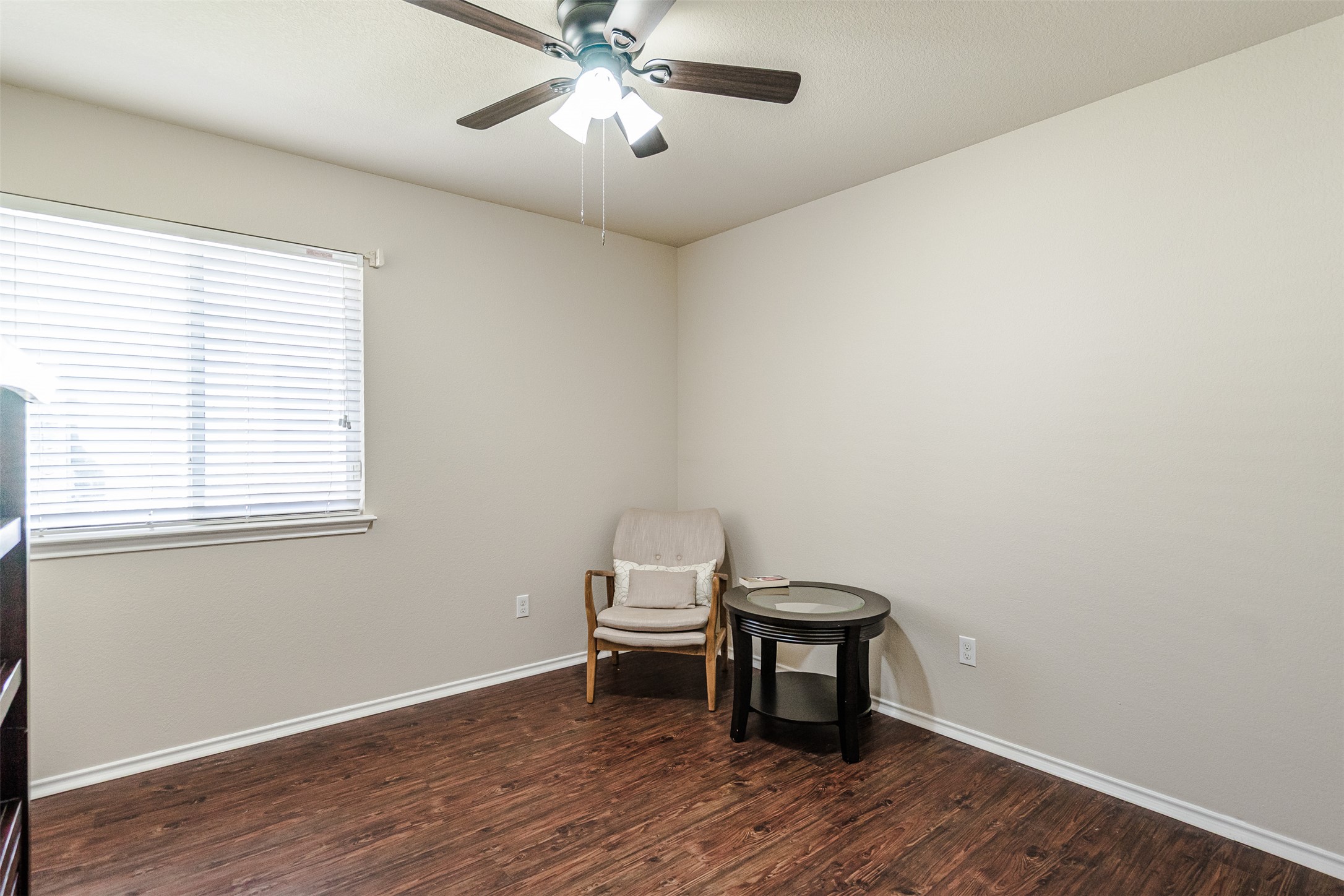 2404 Christoff Loop Austin, TX 78748 - Photo 10 of 24 a bench sitting in a room next to a window