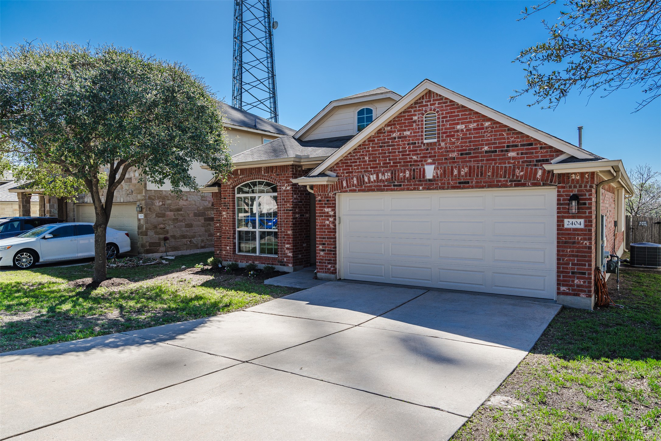 2404 Christoff Loop Austin, TX 78748 - Photo 22 of 24 a front view of a house with garden