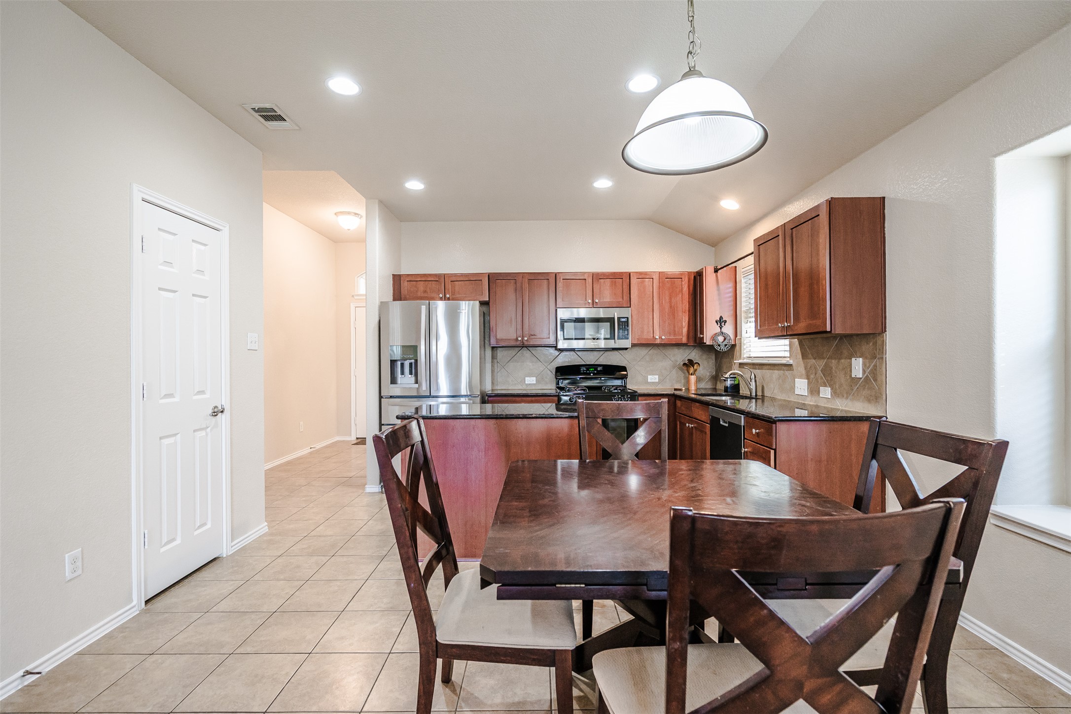 2404 Christoff Loop Austin, TX 78748 - Photo 2 of 24 a view of a dining room with furniture