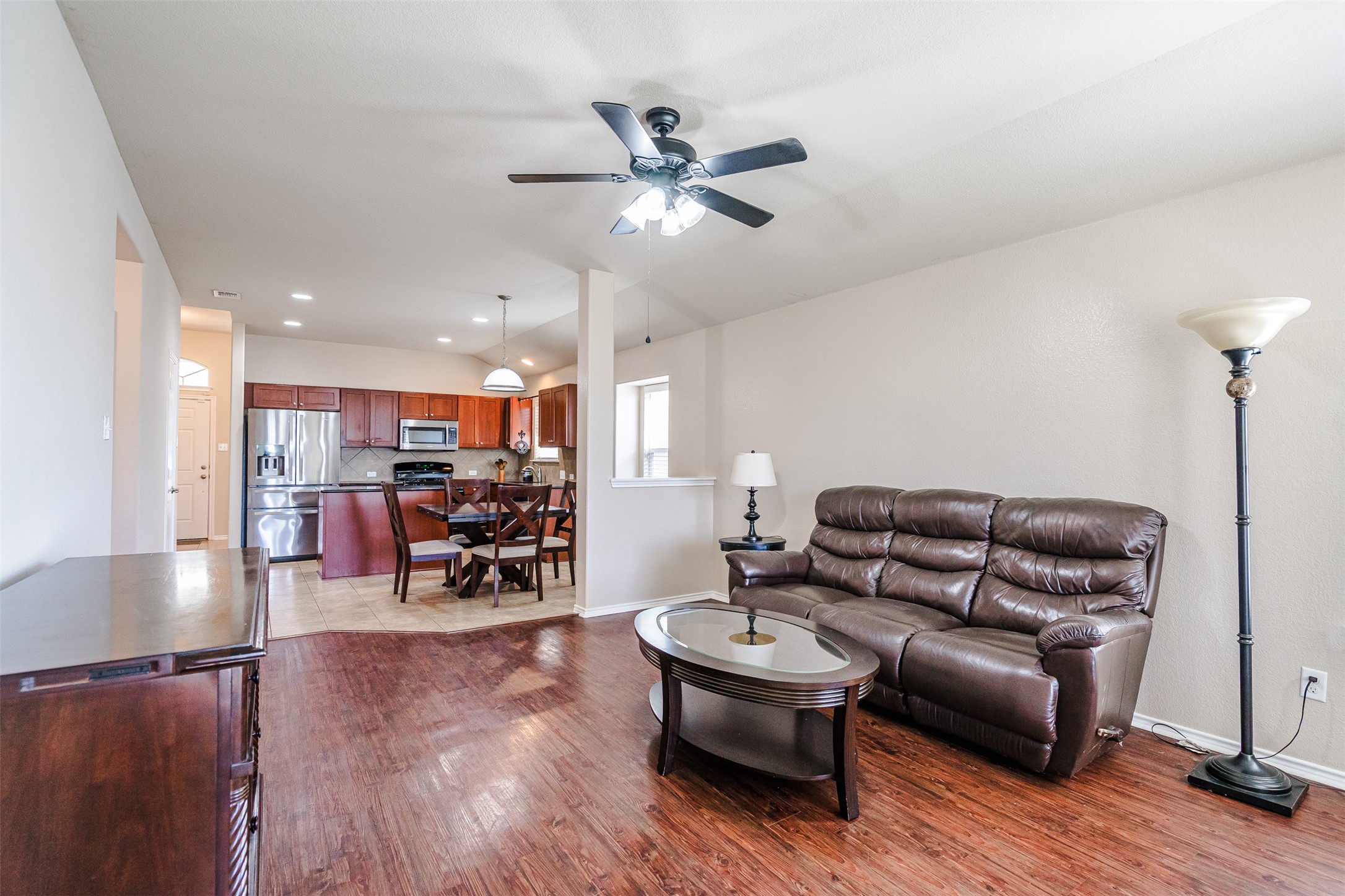 2404 Christoff Loop Austin, TX 78748 - Photo 24 of 24 a living room with furniture and wooden floor