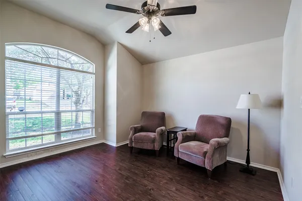 a kitchen with stainless steel appliances granite countertop wooden cabinets a stove top oven a sink and dishwasher