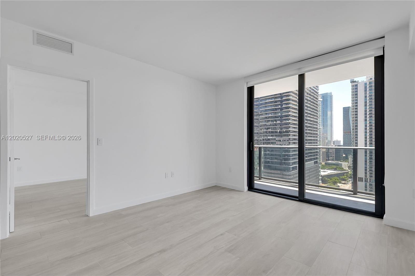 45 Southwest 9th Street, Unit 2105 Miami, FL 33130 - Photo 8 of 27 a view of an empty room with a window
