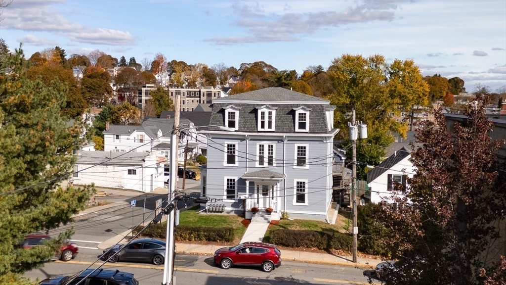 47 Mechanic Street, Unit 2 Marlborough, MA 01752 - Photo 21 of 26 a car parked in front of a building