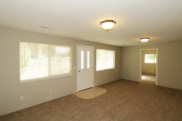 4782 Lower River Road Grants Pass, OR 97526 - Photo 7 of 28 a view of an empty room with a window