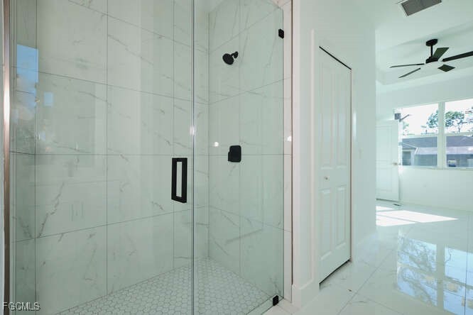 3421 55th Street West Lehigh Acres, FL 33971 - Photo 21 of 38 a bathroom with a shower