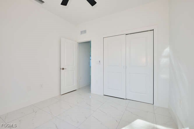 3421 55th Street West Lehigh Acres, FL 33971 - Photo 23 of 38 a view of an empty room