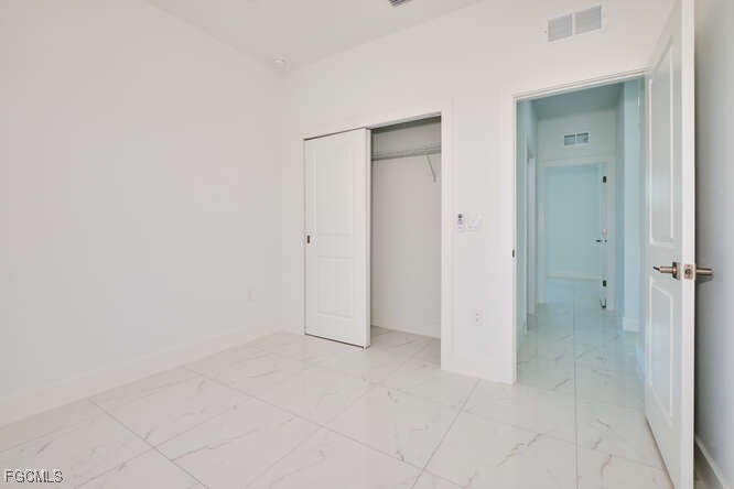 3421 55th Street West Lehigh Acres, FL 33971 - Photo 27 of 38 a view of an empty room