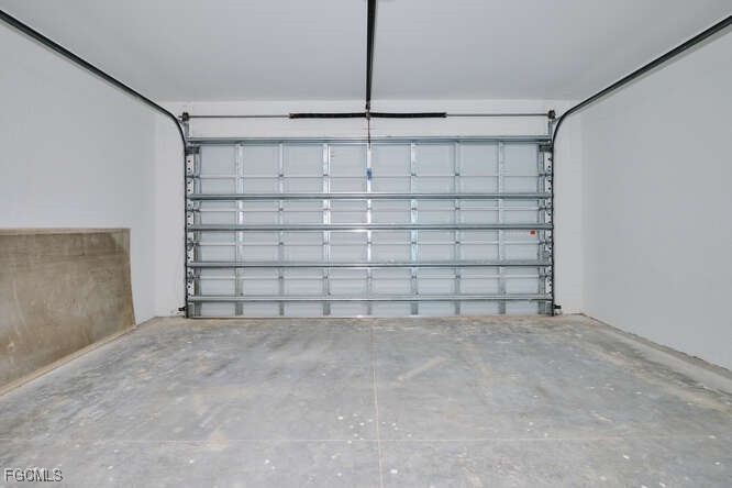 3421 55th Street West Lehigh Acres, FL 33971 - Photo 30 of 38 a view of an empty garage