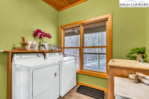 a blue umbrella sitting in front of a building