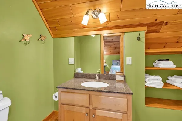 a room with table and chairs