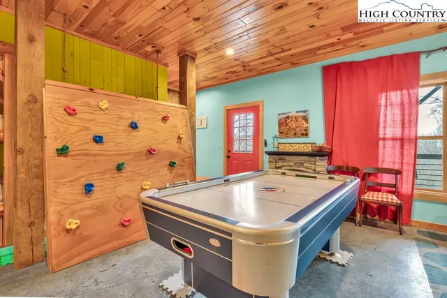 a view of entry way with wooden door