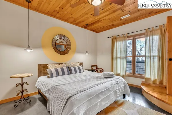 a view of deck with furniture and wooden floor