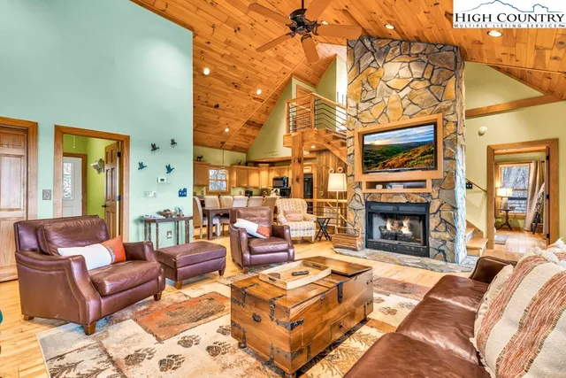 a outdoor space with patio fireplace and a couch