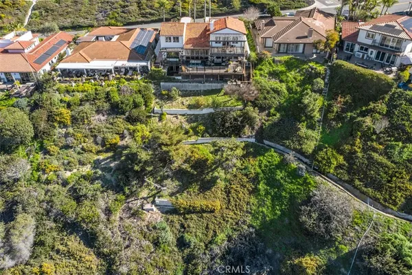 an aerial view of residential building with city view