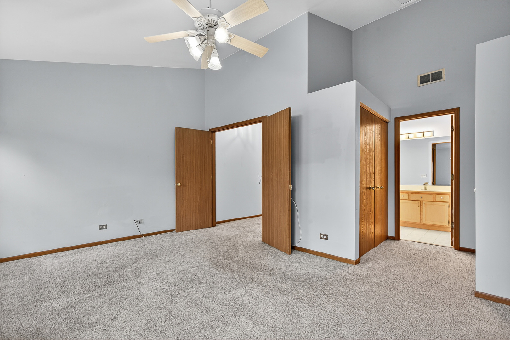 1176 Talbots Lane Elk Grove Village, IL 60007 - Photo 14 of 21 an empty room with windows and closet