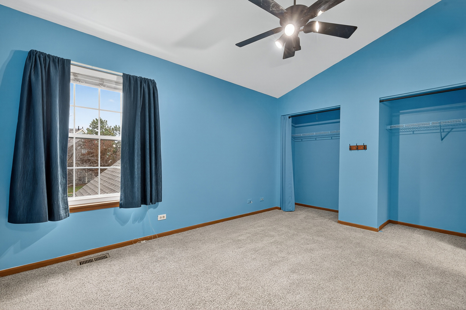 1176 Talbots Lane Elk Grove Village, IL 60007 - Photo 16 of 21 an empty room with chandelier fan