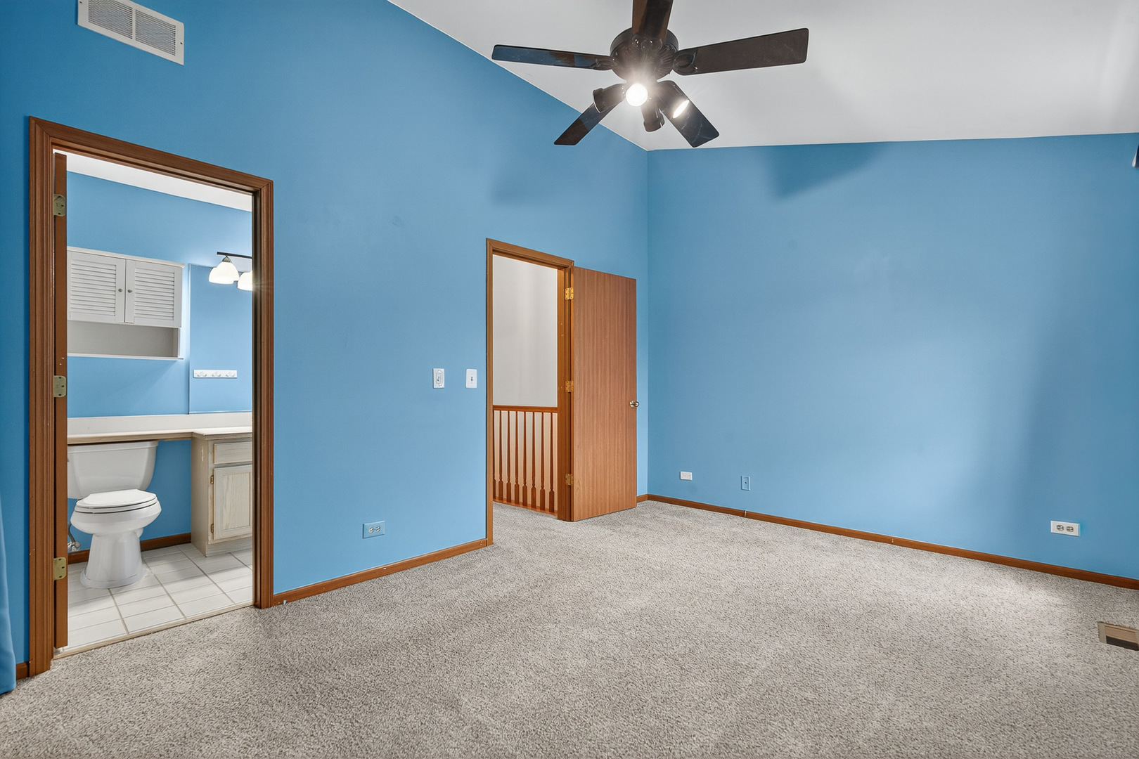 1176 Talbots Lane Elk Grove Village, IL 60007 - Photo 17 of 21 an empty room and chandelier fan