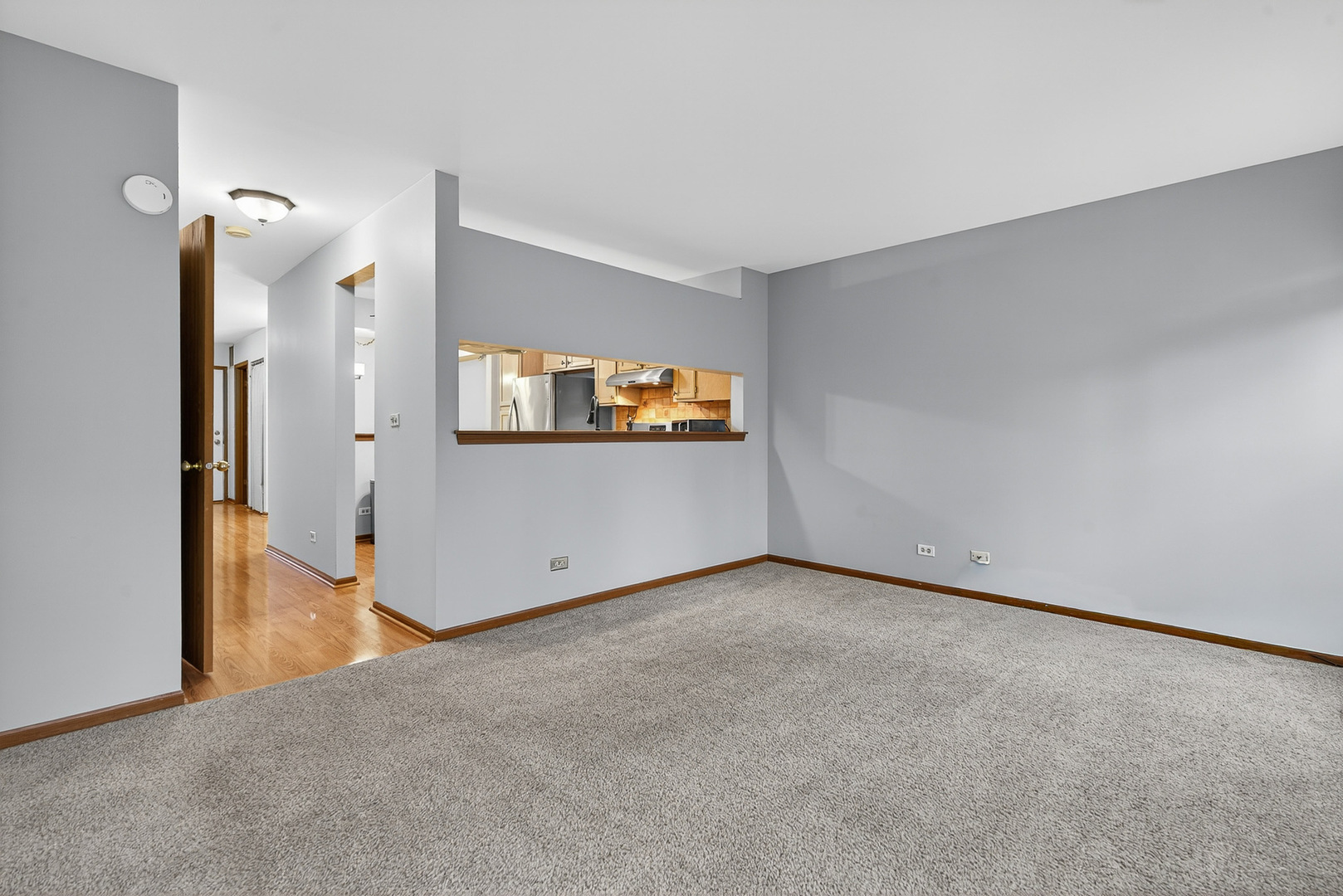 1176 Talbots Lane Elk Grove Village, IL 60007 - Photo 10 of 21 a view of a room with a large window