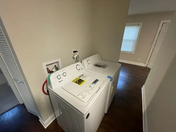 a utility room with dryer and washer