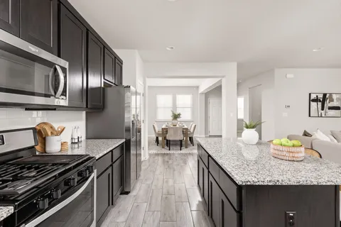 a kitchen with granite countertop lots of counter top space