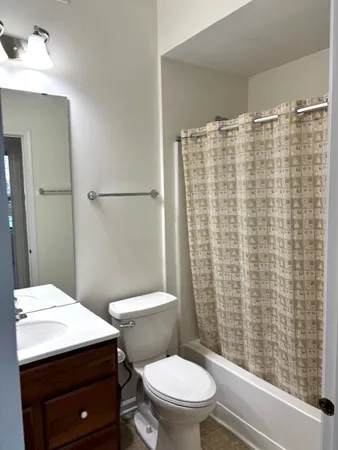 a view of a house with backyard