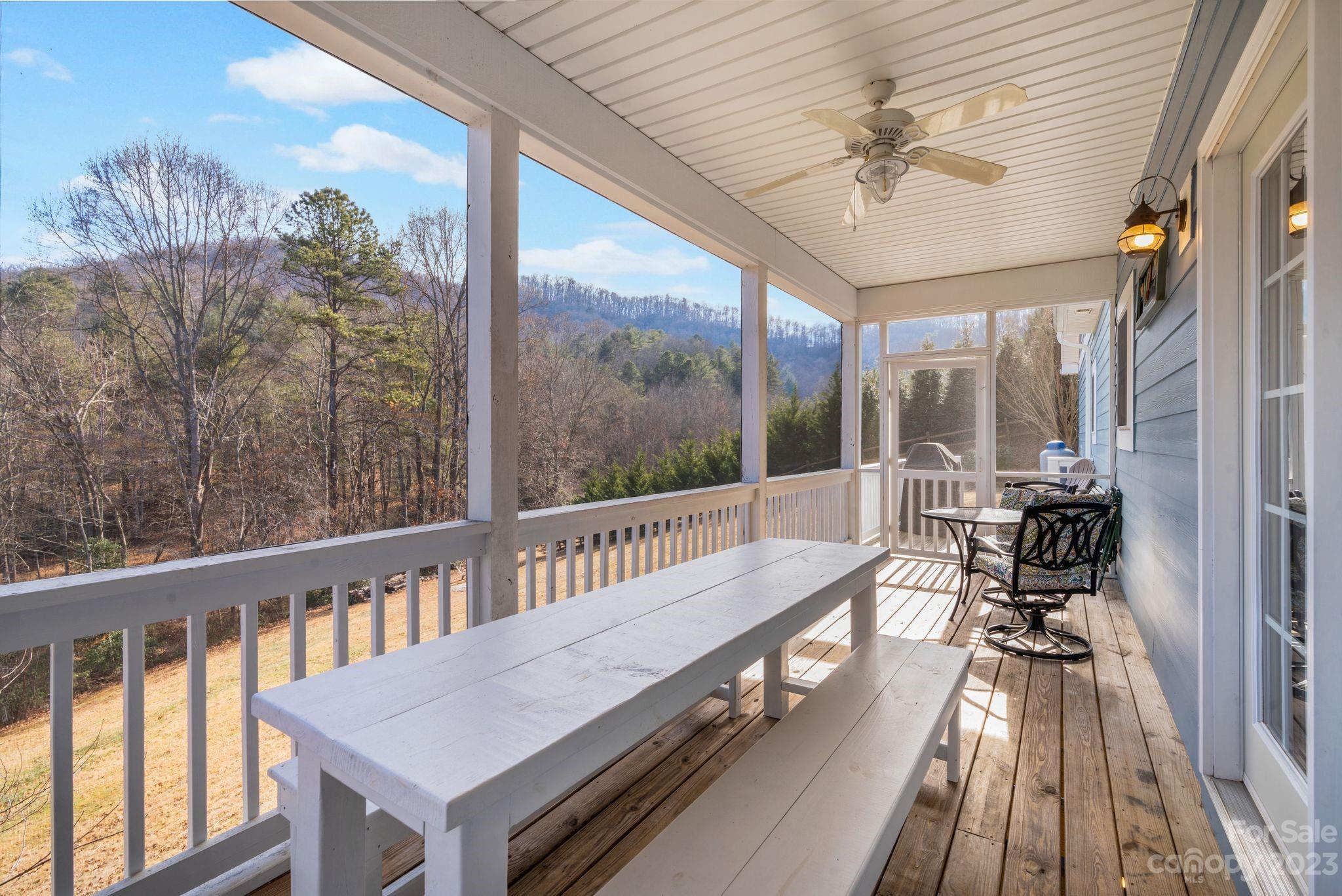 874 Burney Mountain Road Fletcher, NC 28732 - Photo 14 of 37 a view of two chairs in a balcony