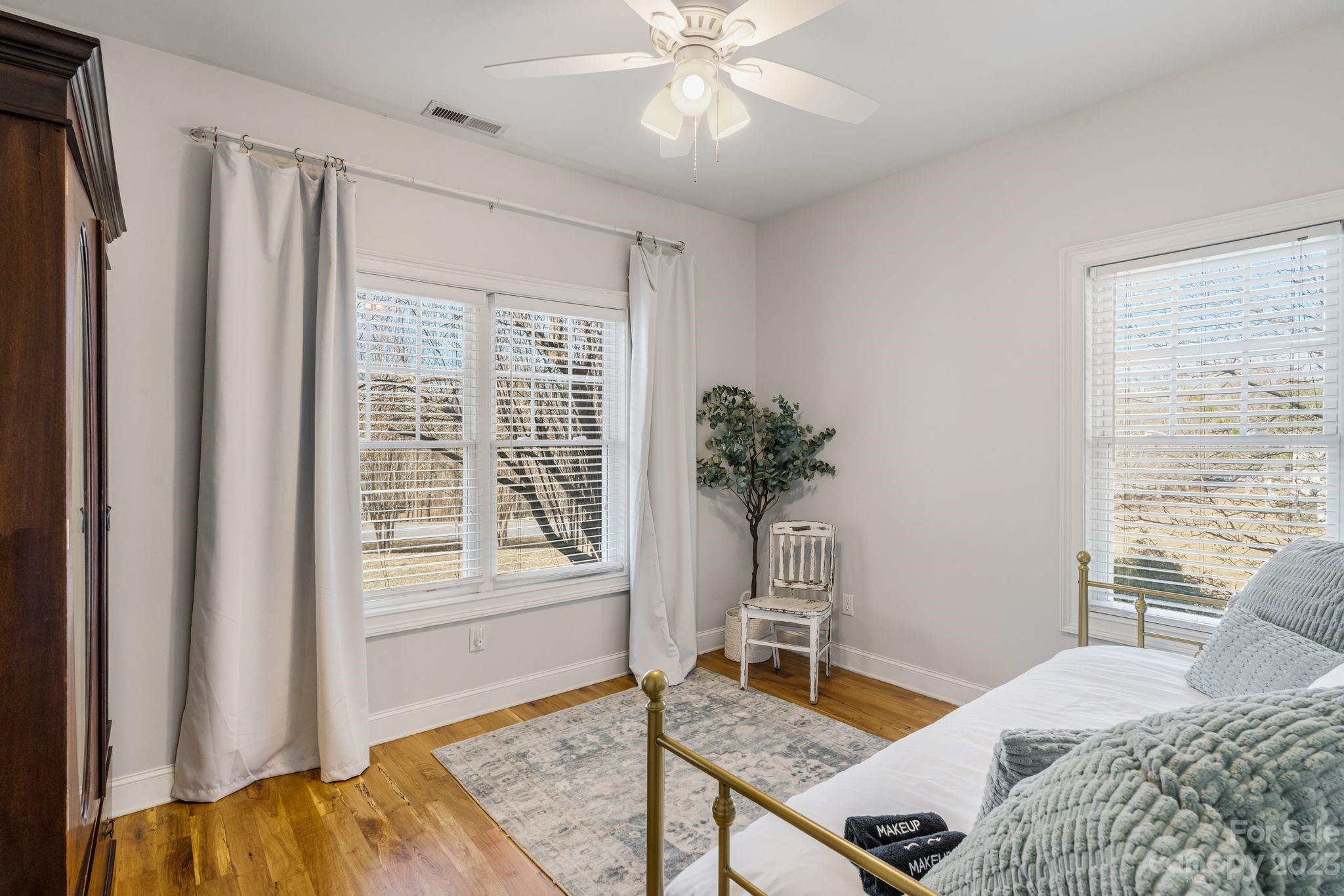 874 Burney Mountain Road Fletcher, NC 28732 - Photo 24 of 37 a bedroom with a bed and a window