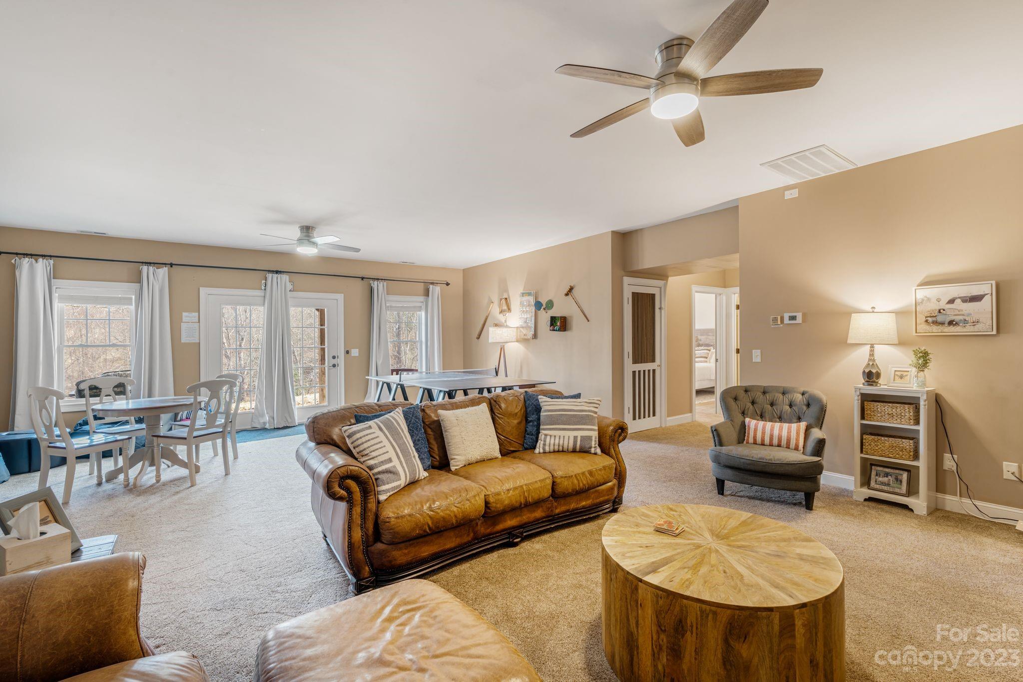 874 Burney Mountain Road Fletcher, NC 28732 - Photo 29 of 37 a living room with furniture and a large window