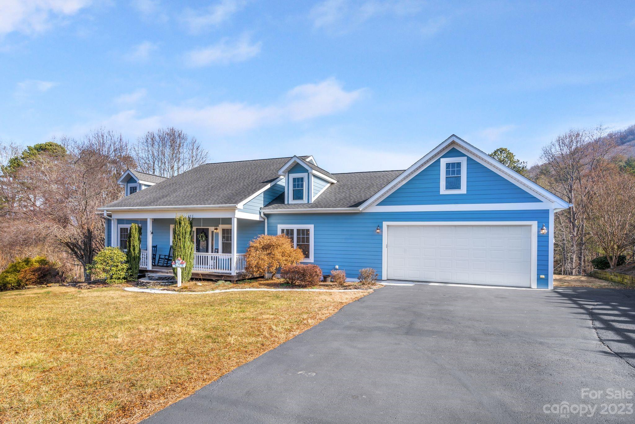 874 Burney Mountain Road Fletcher, NC 28732 - Photo 4 of 37 a front view of house with yard