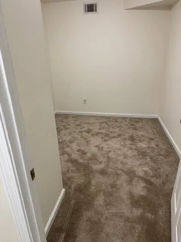 an empty room with a outdoor space