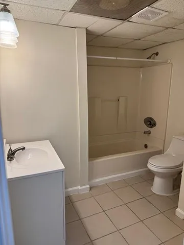 a front view of a house with garage