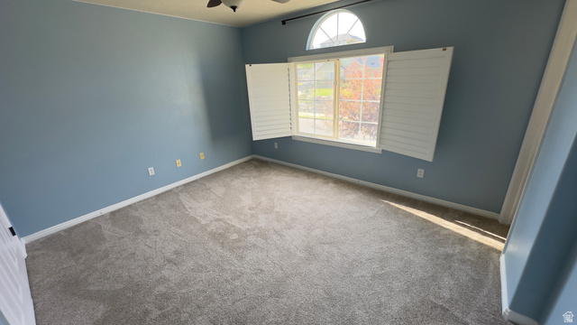 3547 East Golden Eagle Road Eagle Mountain, UT 84005 - Photo 21 of 47 Empty room featuring carpet floors and a ceiling fan