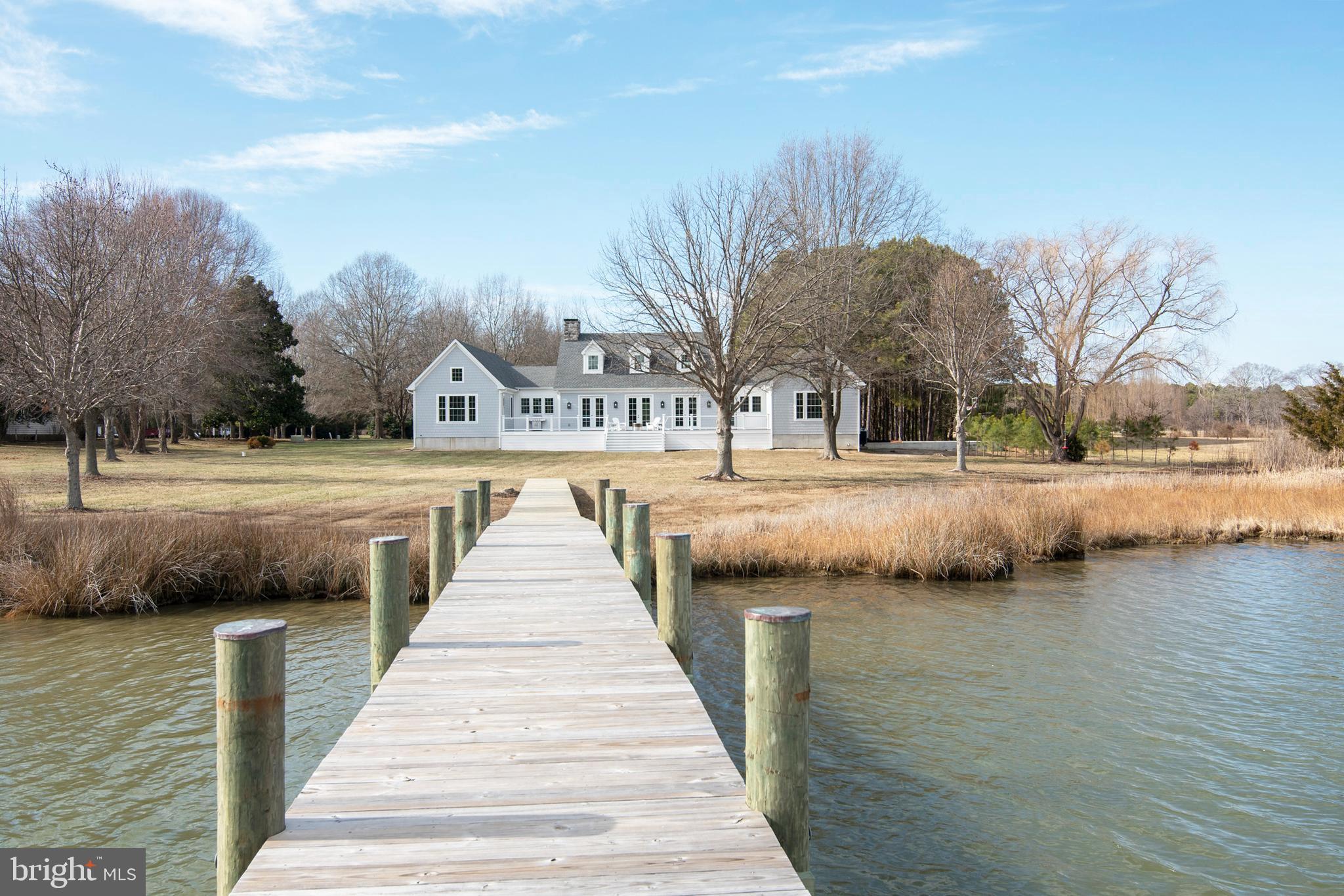 21825 Langdon Farm Road Sherwood, MD 21665 - Photo 11 of 47 a view of a lake with houses