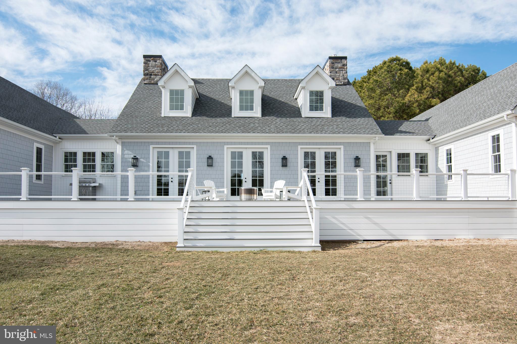 21825 Langdon Farm Road Sherwood, MD 21665 - Photo 17 of 47 front view of a house with a swimming pool