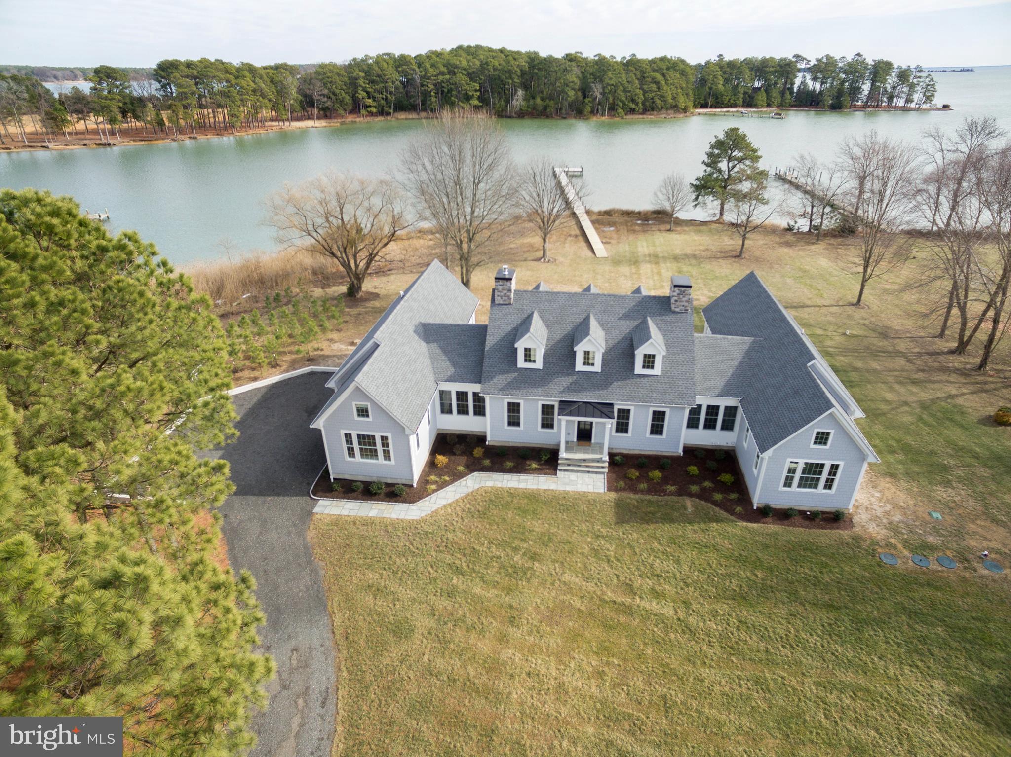21825 Langdon Farm Road Sherwood, MD 21665 - Photo 2 of 47 a view of a house with a lake view