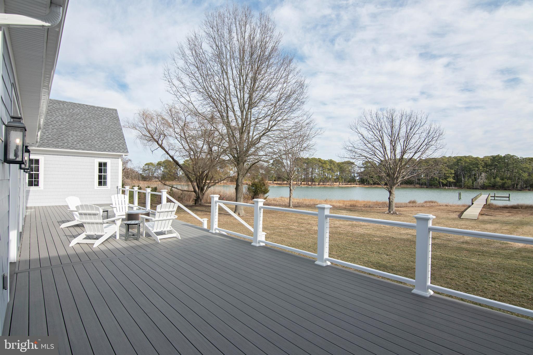 21825 Langdon Farm Road Sherwood, MD 21665 - Photo 21 of 47 a view of house with yard and sitting area