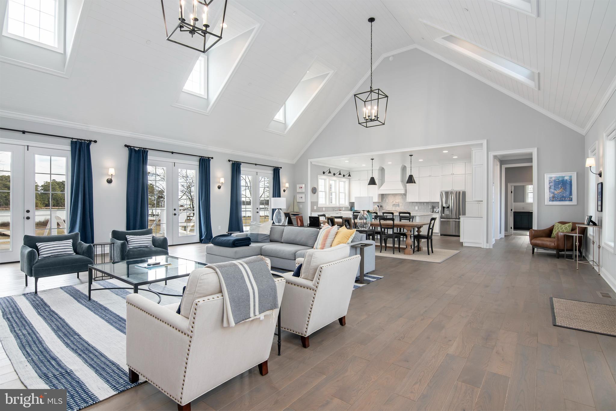 21825 Langdon Farm Road Sherwood, MD 21665 - Photo 30 of 47 a living room with furniture and a table